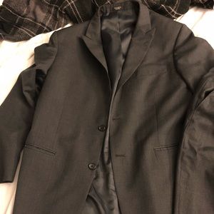 Full charcoal grey suit.